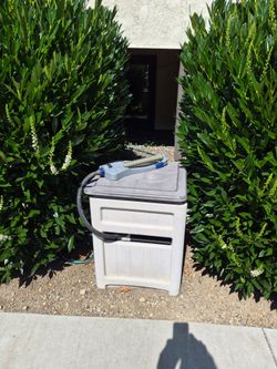 Garden hose storage box and hose