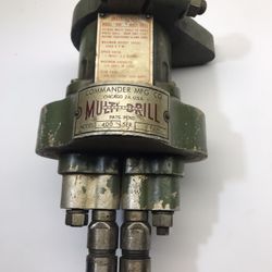 Dual spindle tapping head