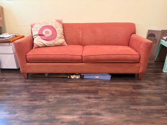 Crate & Barrel orange couch