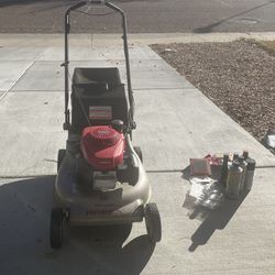 Honda Gas Lawnmower and Supplies 