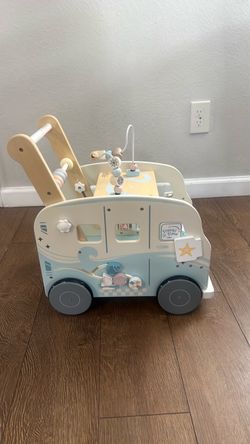 Wooden blue push walker