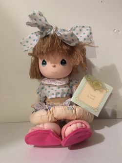 Precious moment collectible doll