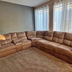 Beautiful Elegant Upscale Luxury All Electric Powered Italian Leather Sectional Sofa With Storage And Cup Holders And Built In Sofa Bed