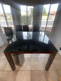 Dining Table with Black Glass Top
