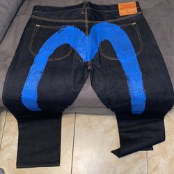 EVISU JEANS SZ 42 BRAND NEW