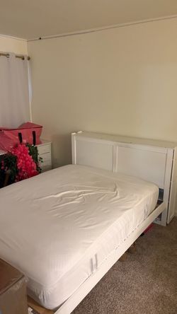 White full bed with storage and mattress