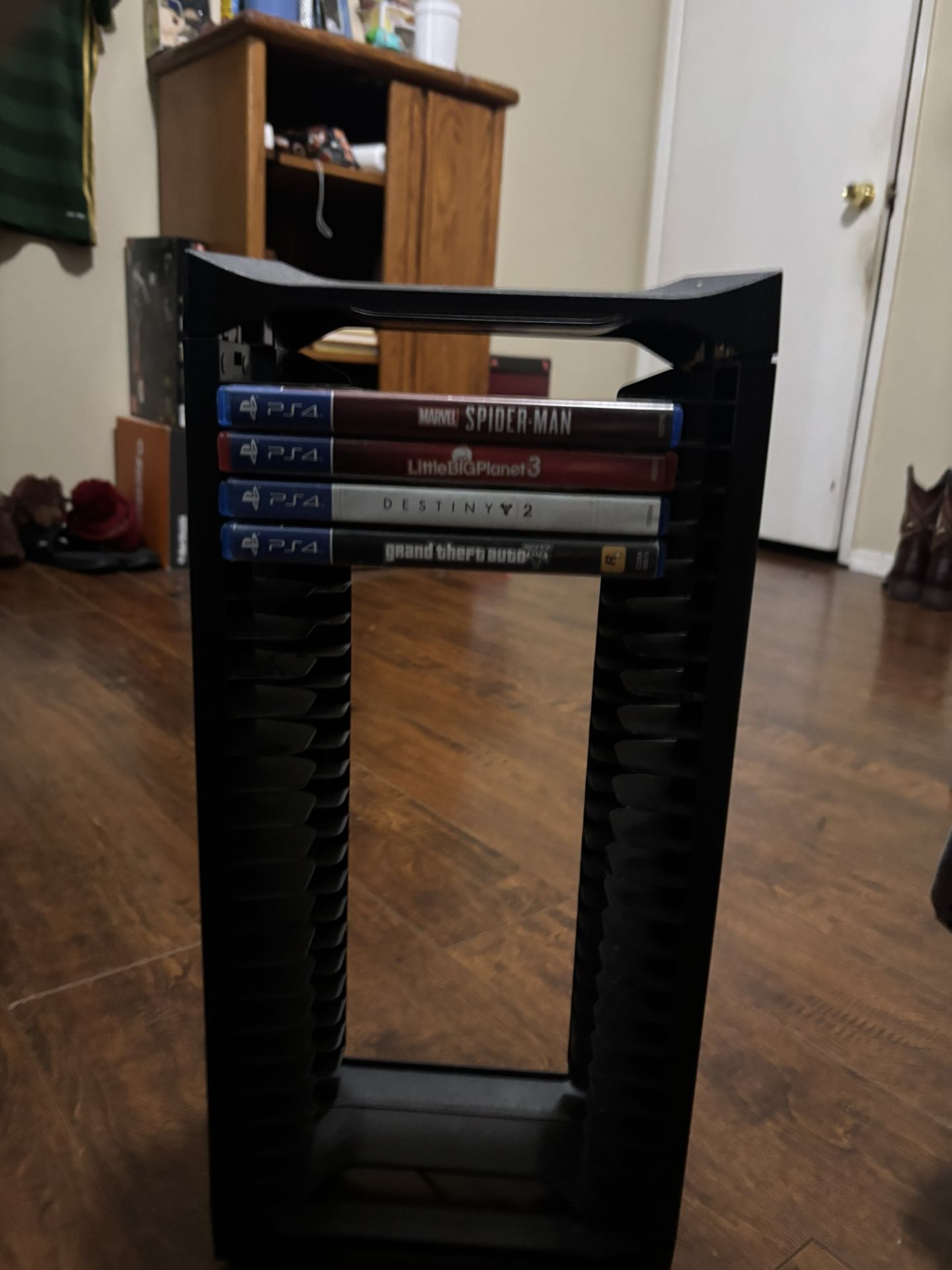 Game Stand With Video Games Including 