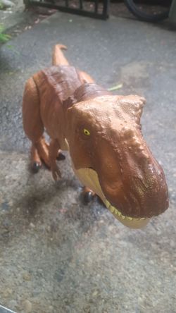Jurassic World Super Colossal Tyrannosaurus Rex dinosaur figure.