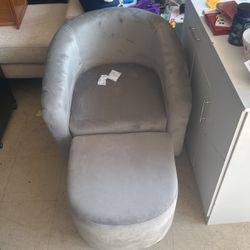 Gray chair with ottoman
