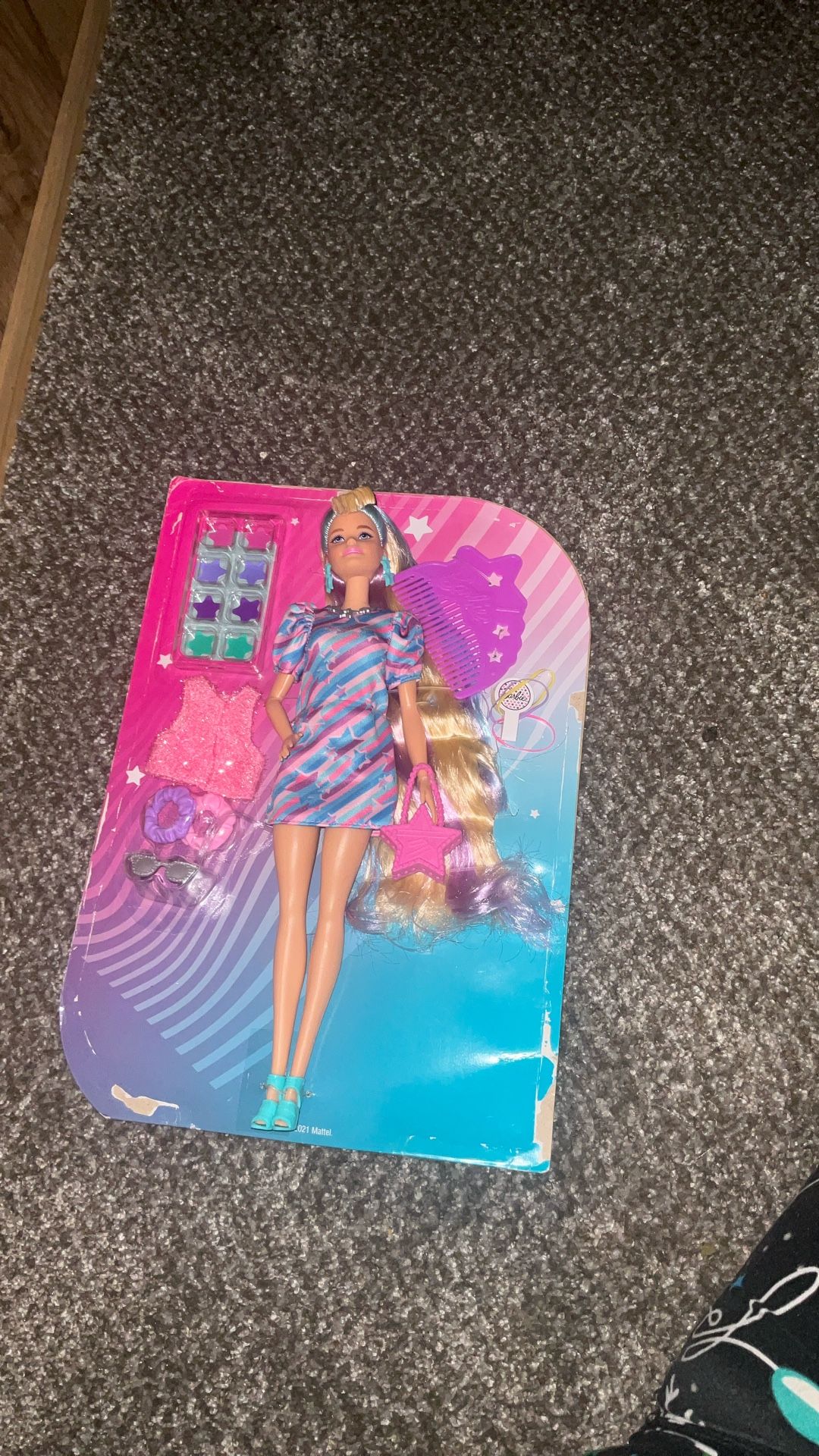 Barbie brand new box ripped open Barbie still attached to what’s left of the box