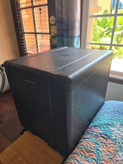 Extra large black Styrofoam ice chest, w/ ice packs