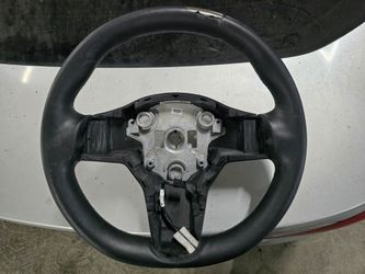 Tesla steering wheel used