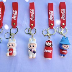 LaBubu Coca Cola -  $10.00 Each —Cute Keychains - Cool Pendant Accessories, Kawaii Key Ring for Purse, Backpack, Car Charms for Men/Women & Kids