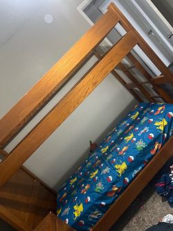 Wooden bunk bed and couches