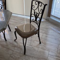 5 Rought Iron Chairs