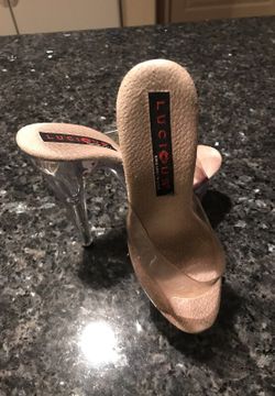 Pair of clear plastic peep-toe stilettos, size 5
