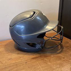 Softball batting helmet with a facemask, size 7-1/8” - 7-3/4”