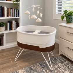 Happiest Baby SNOO Smart Sleeper with extensive accessories.
