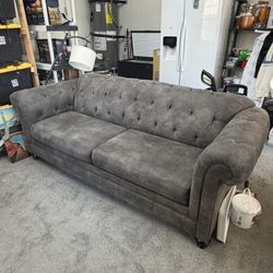 Gray Tufted Chesterfield Style Sofa – 95” Long – Good Condition