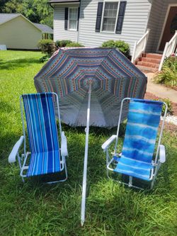 beach umbrella and 2 chairs.