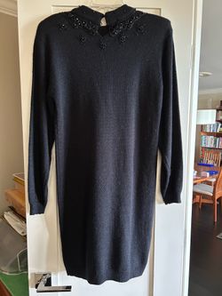 Black ‘sweater’ dress.