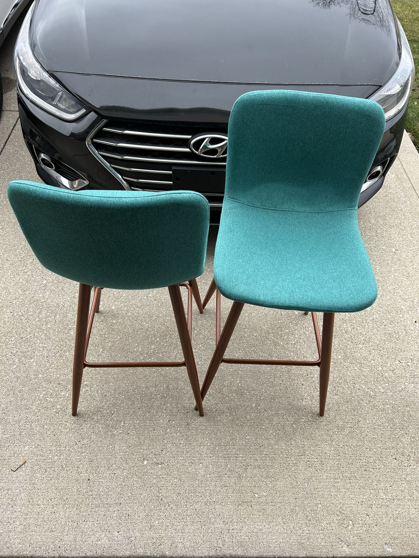 A SET OF TEAL CHAIRS ON SALE! 