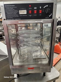 Benchmark USA 51012 Humidified Rotating Pizza / Pretzel Display Warmer