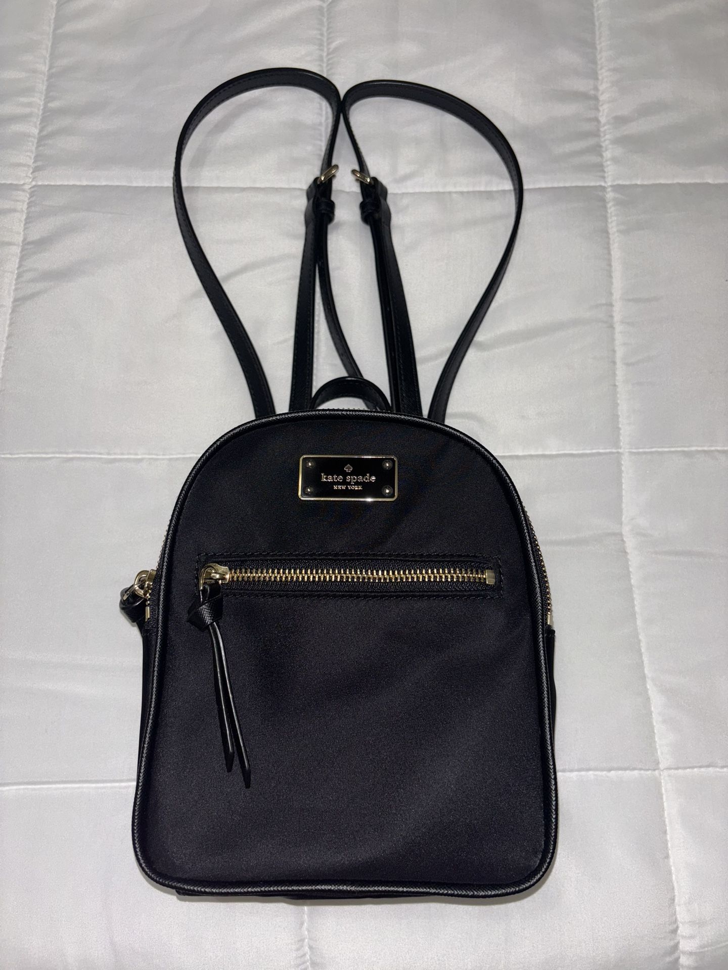kate spade mini backpack black and white this elegant backpack is made from smooth quilted satin Kate Spade - Brandclub -