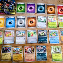Mixed bulk pokemon 78 cards + tin