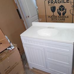 36 " Vanity Complete , Faucet And Walls Lite $350 Everything 