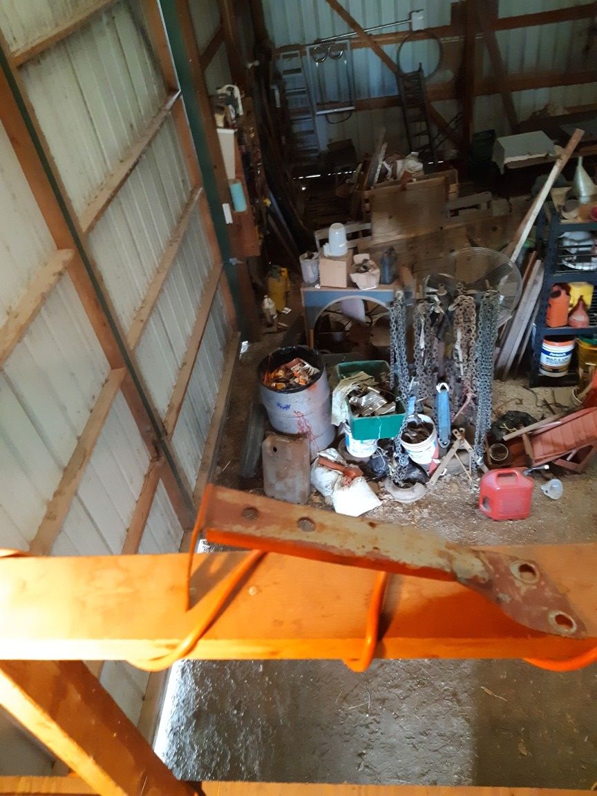 Tail light bracket for a Ford tractor