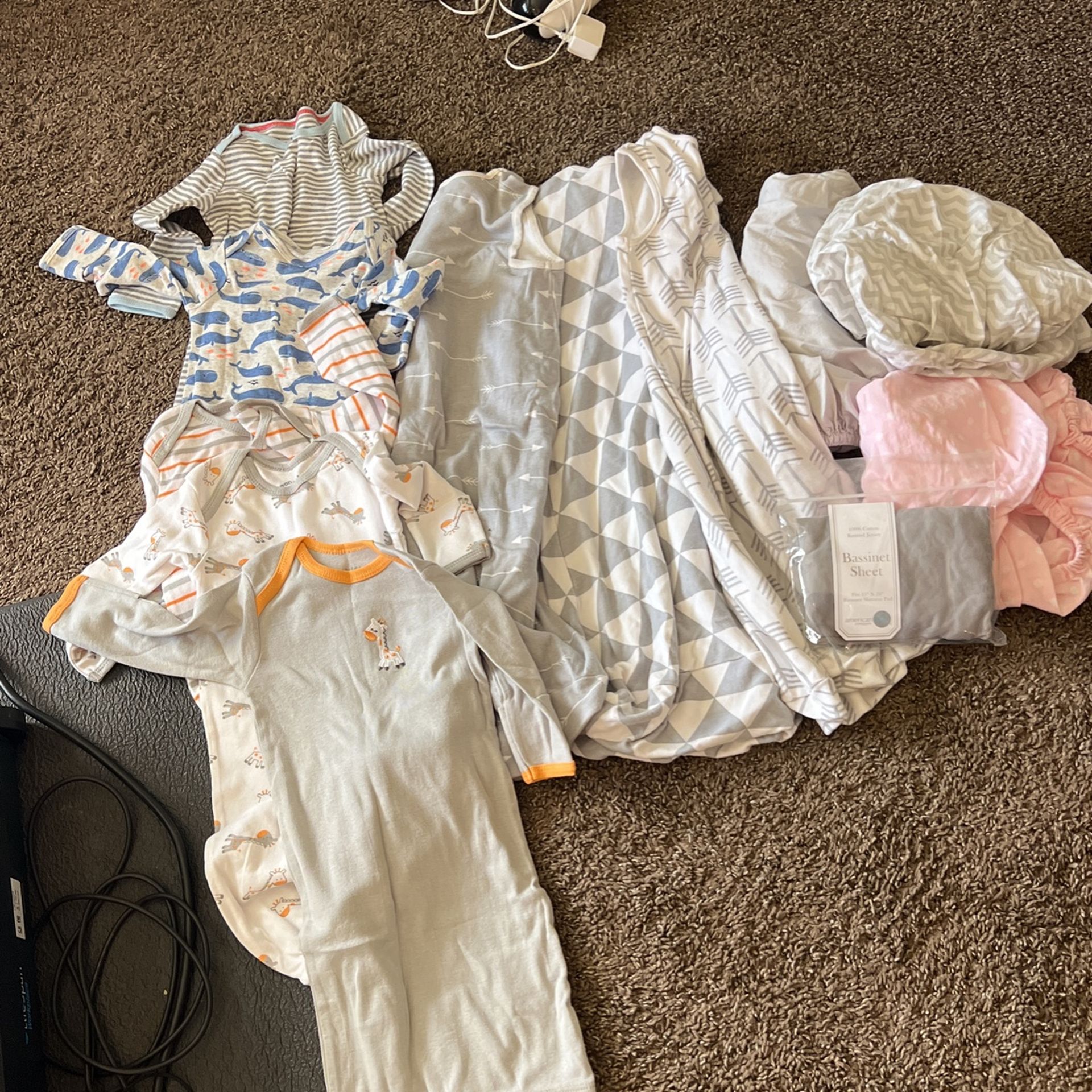 Newborn baby lot. Nightgowns, sleep sacks, bassinet sheets.
