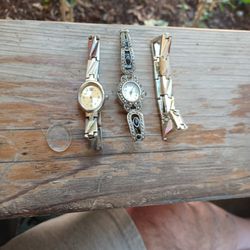 2 Watches And A Bracelet 