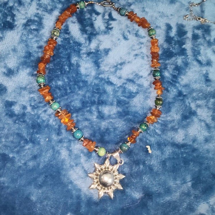 Faceted Tunduru Sapphire Gemstone Necklace, Sterling Silver Amber Sun Pendant