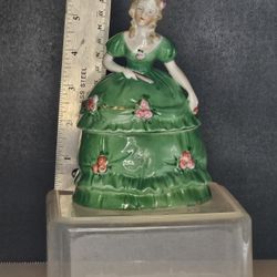 VTG Porcelain Trinket / powder box. Lady with light brown ringlets in green dress
