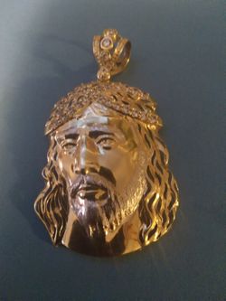 JESUS FACE PENDENT. 10k 12.6g $550