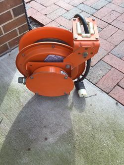 Econo automatic-wind cord reel