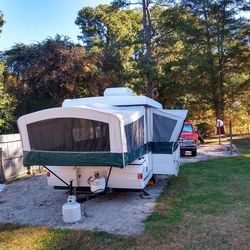 2000 Colman Utah Pop-Up Camper 12ft with slide-out dinette & A/C unit!