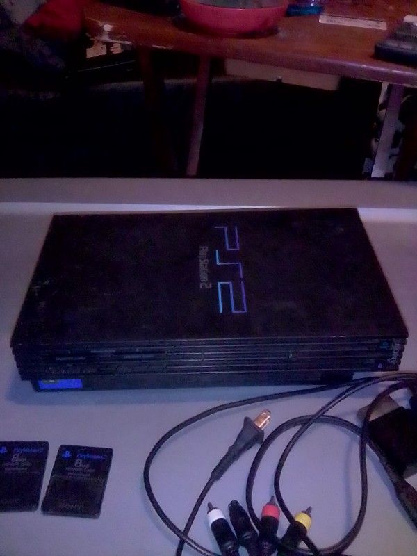 Playstation 2 With Power Cord HDMI Cord And Controller It Also Come With Two 8 MB Memory Card