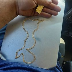 14k Gold Chain And 10 K Pendant