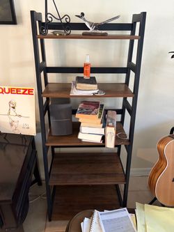 Two matching bookshelves and a TV stand