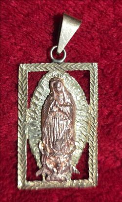 14k gold Virgin Mary pendant 8.6 gms