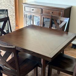 Solid Wood Dining Table Set with four chairs and a hutch excellent