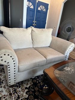 Beige Fabric 2 loveseats and a sofa  with Nailhead Trim