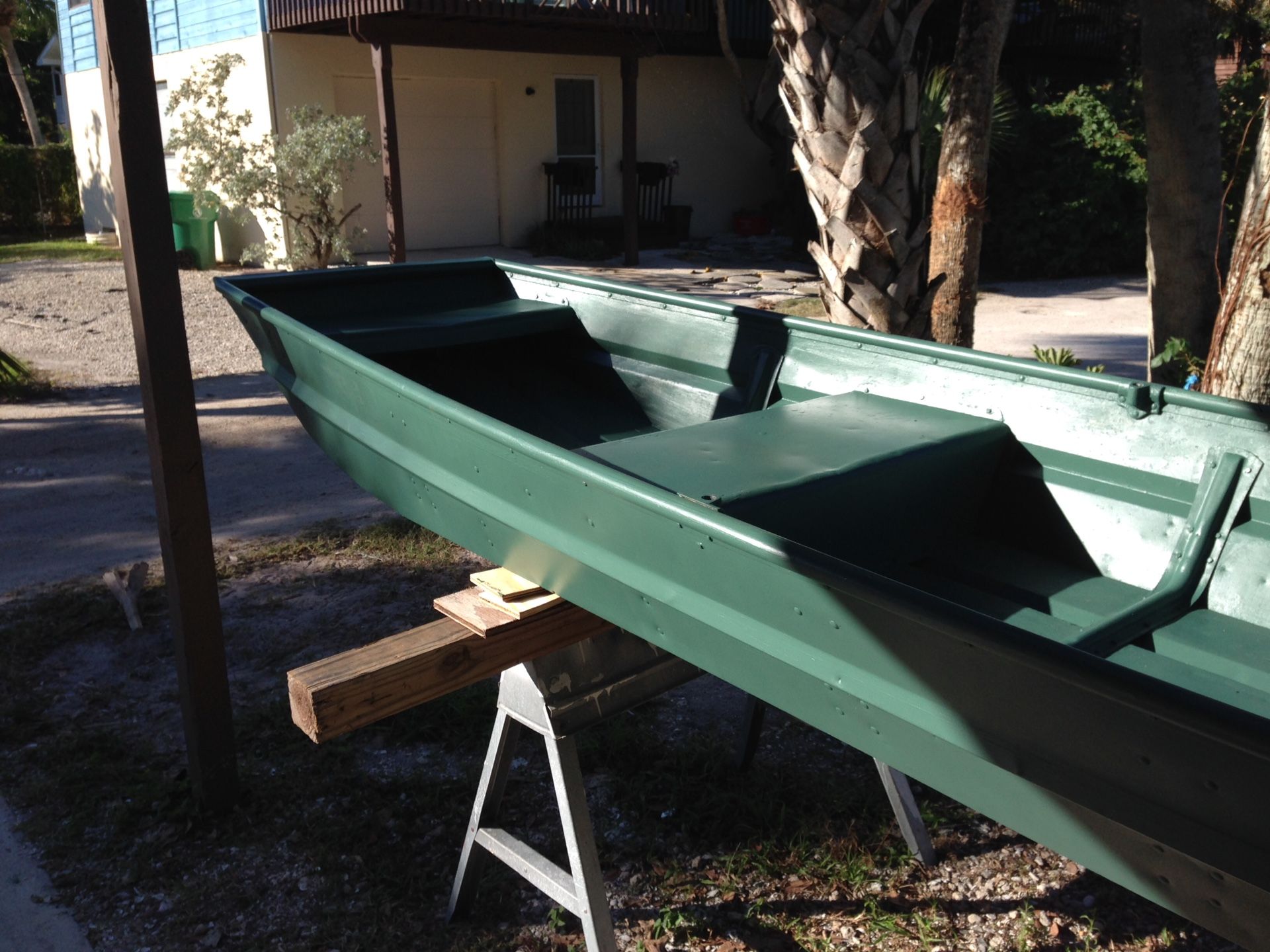 12 ft john boat with 4-1/2 hp mercury and trolling motor and accessories 650.00