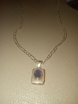 Sterling silver necklace , nine 925 in tanzanite pendant