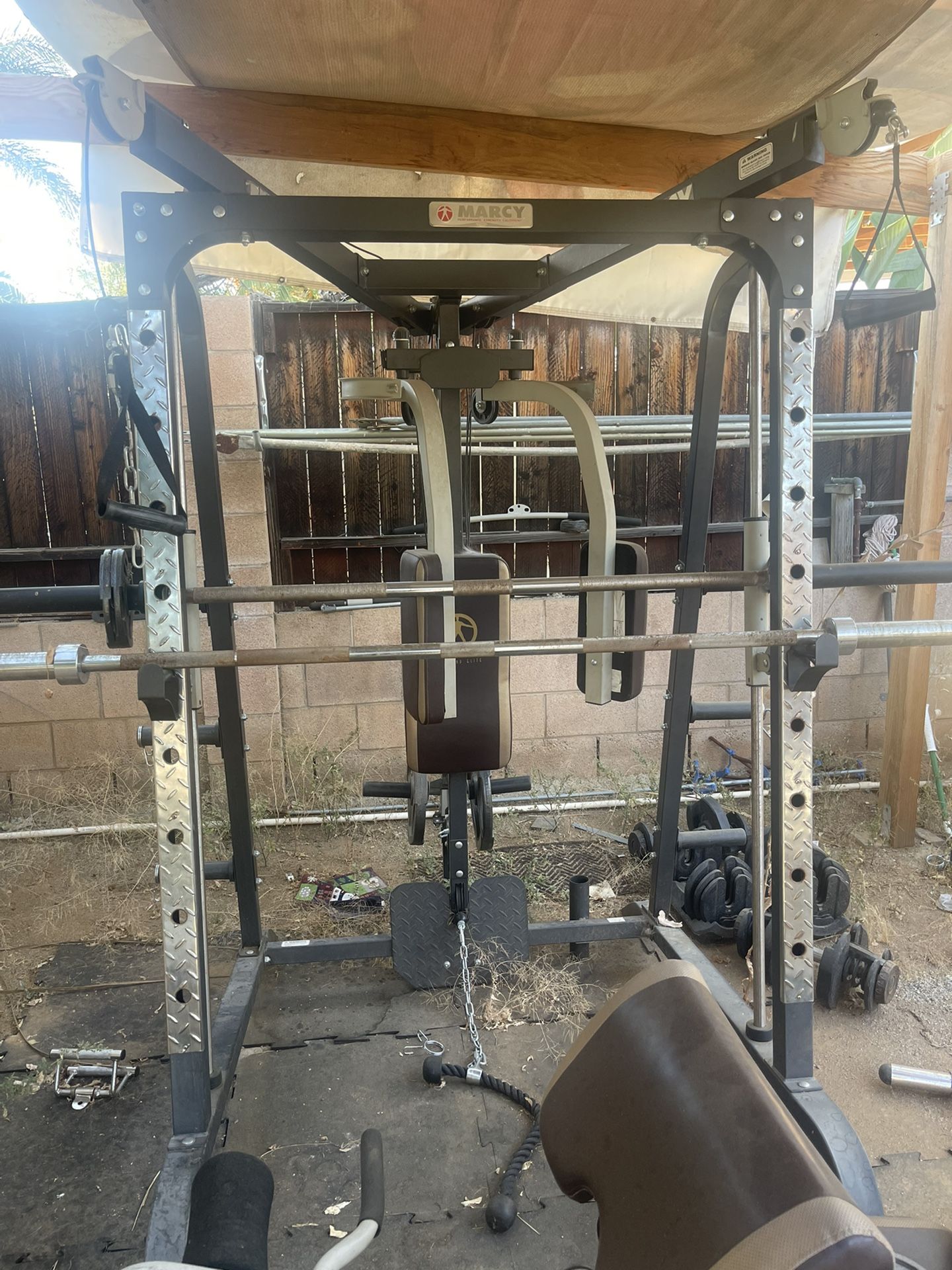 Marcy MD9010G Smith Machine System includes Olympic bar and Plates for