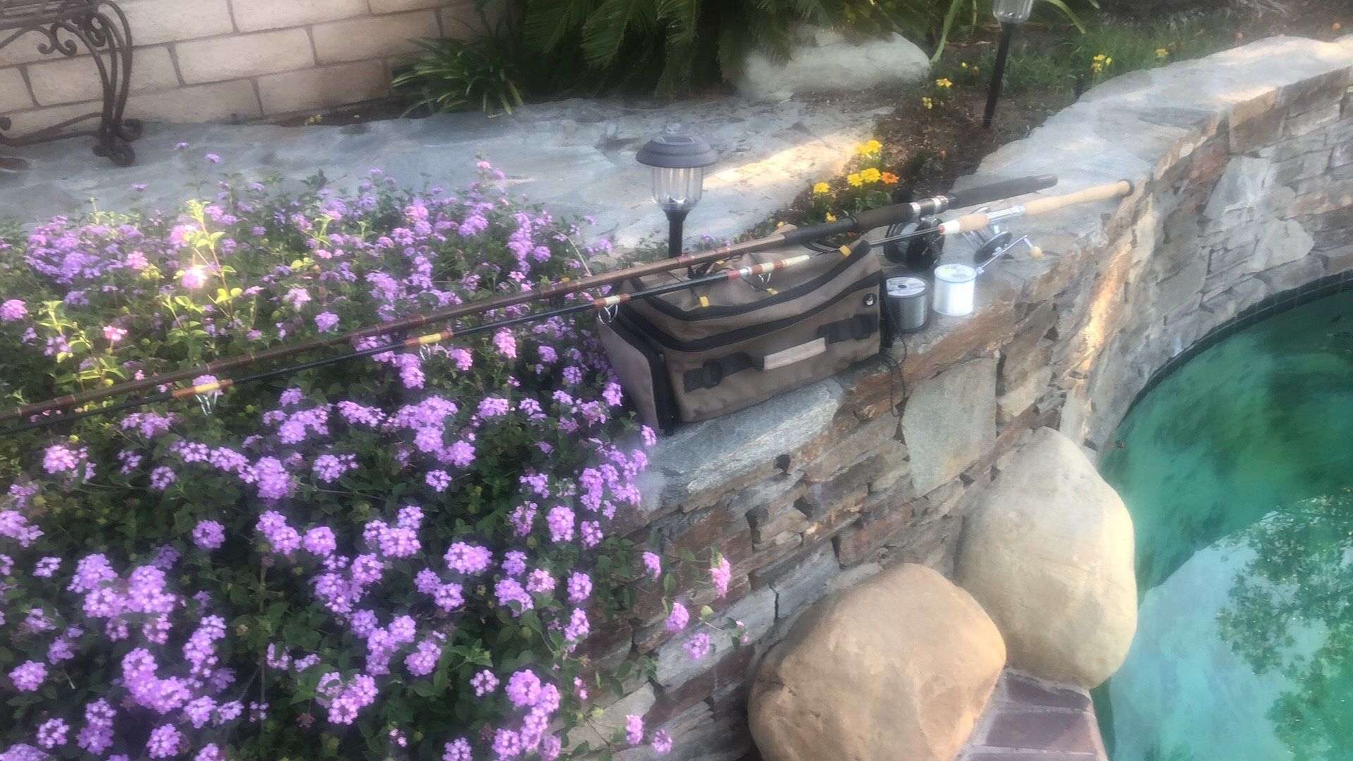 Two Saltwater Fishing Rods with Penn Reels with Tackle Bag with three