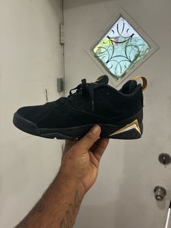 Jordan Low-Top Black and Gold Sneakers