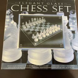 Elegant Glass Chess Set w/Beveled Glass Board and Glass pieces w/Felt Bottoms. Condition is "New".  Great Gift!  Merry Christmas 🎁🎄!